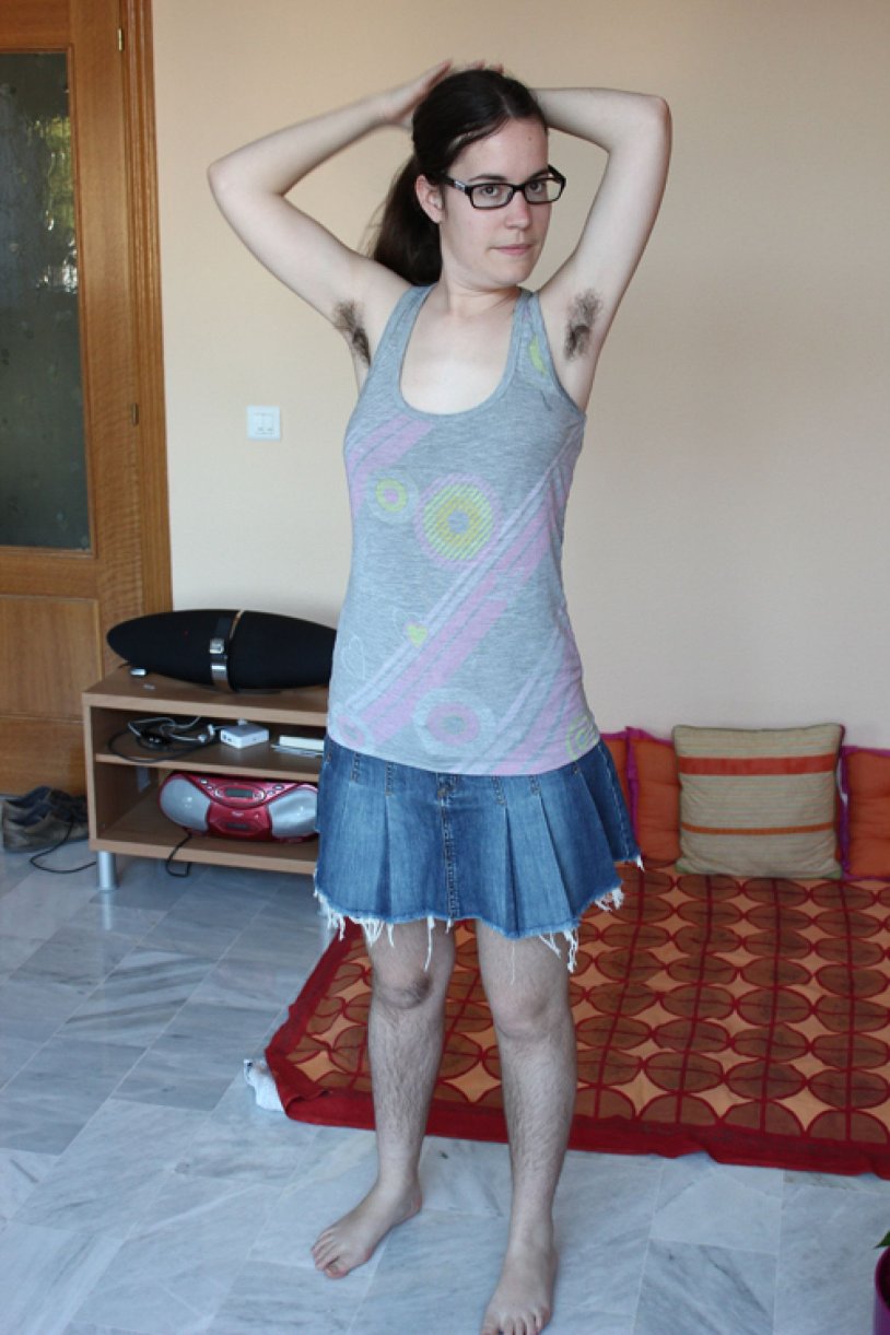 Girl with big breasts in a turtleneck