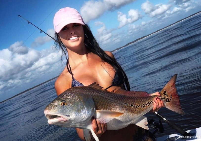 Girl with fish in her hands