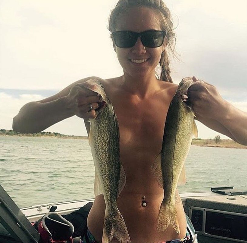 Girl with fish in her hands