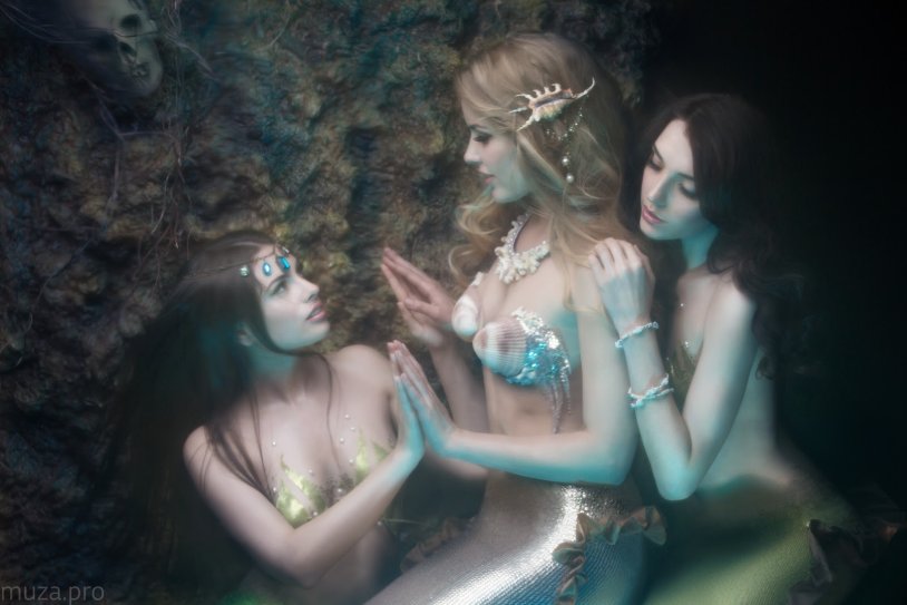 Three mermaids