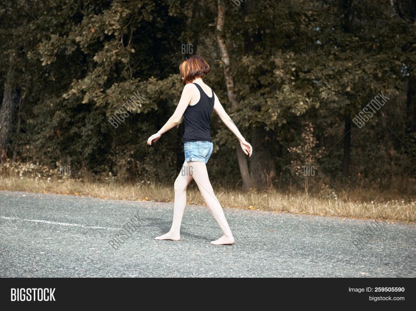 The girl walks barefoot