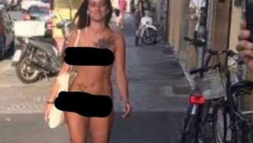 Naked woman walked along the street