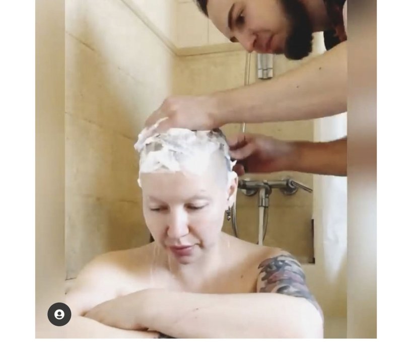 The girl shaves her head