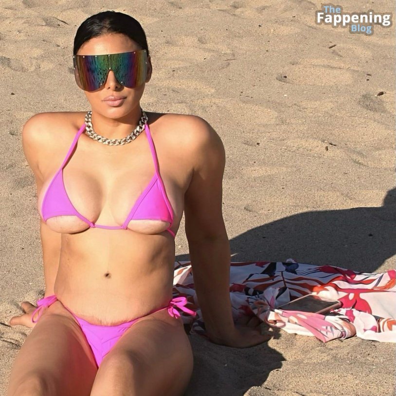 Kim Kardashian in pink bikini
