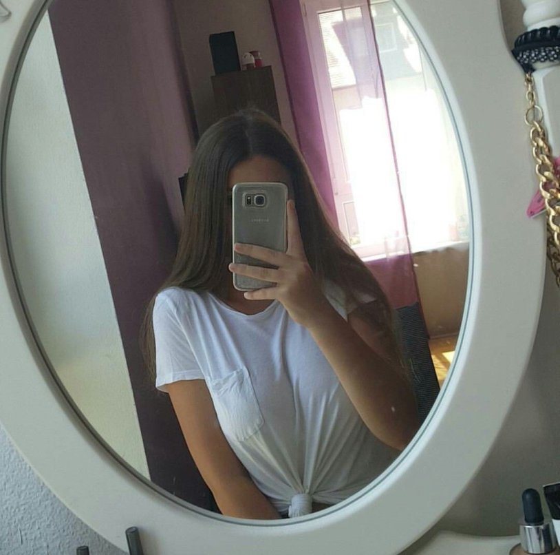 Beautiful girl in the mirror