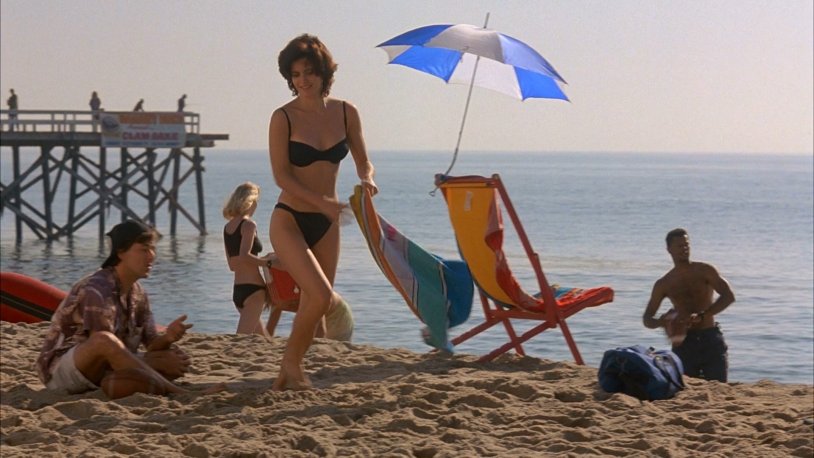 Emily Cox in a swimsuit