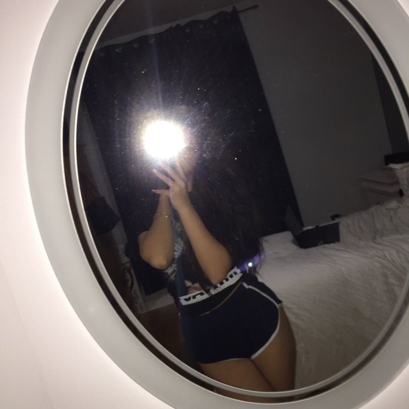 Girl near the mirror