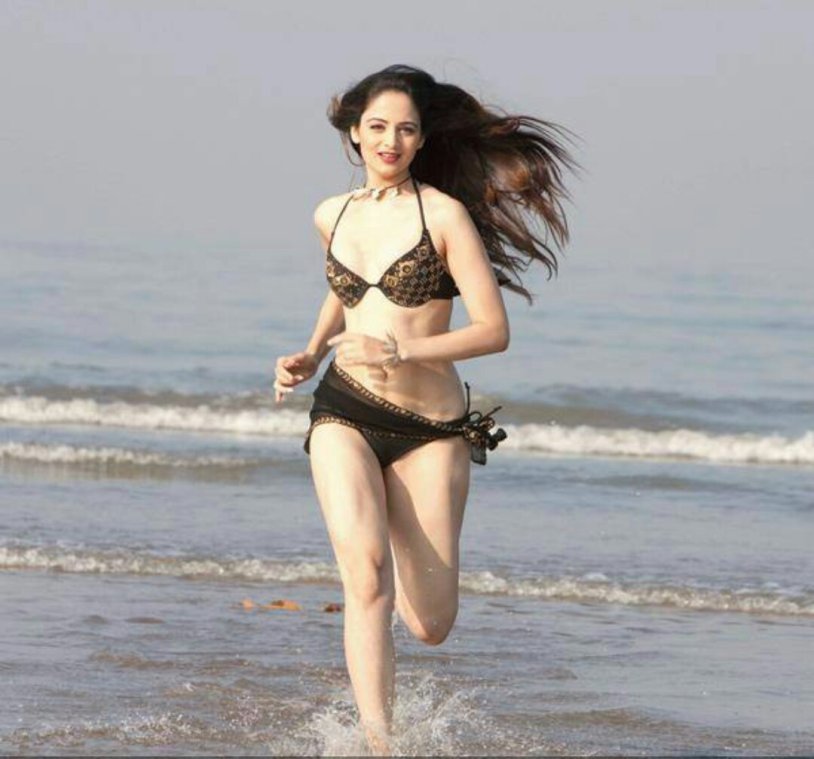 Zoya Kular in a swimsuit