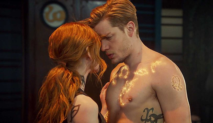 Dominic Sherwood and Katherine McNamara Kiss