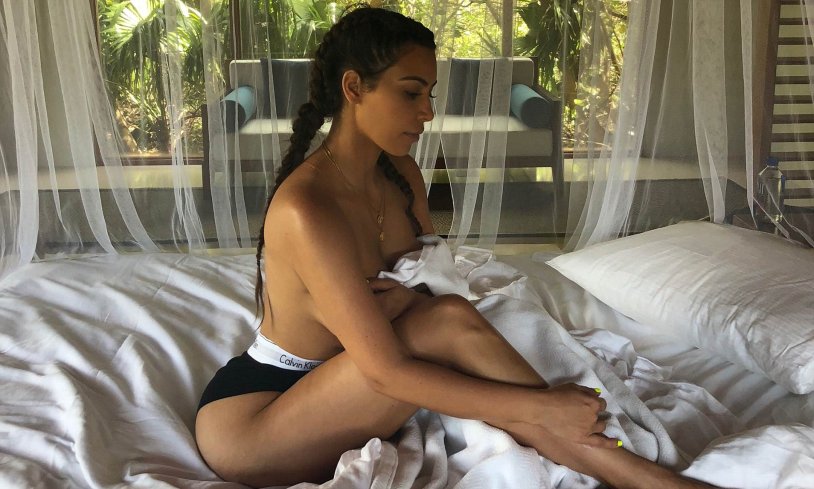 Kim Karddyashan on the bed