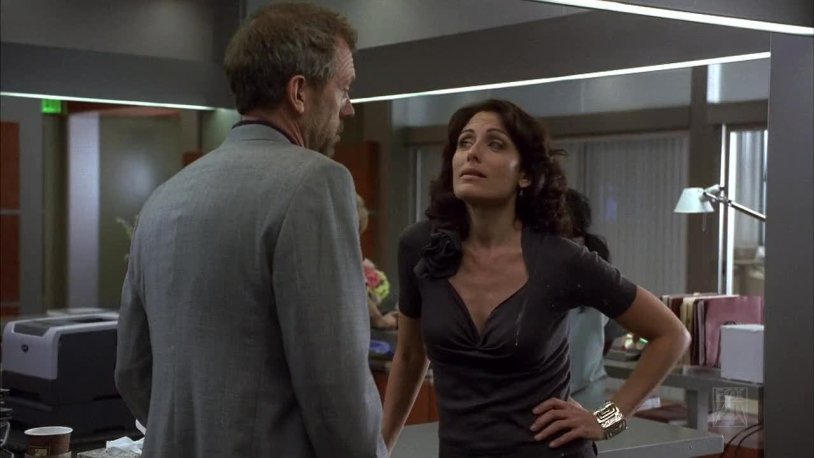 Lisa Edelstein and Hugh Lauri Kiss