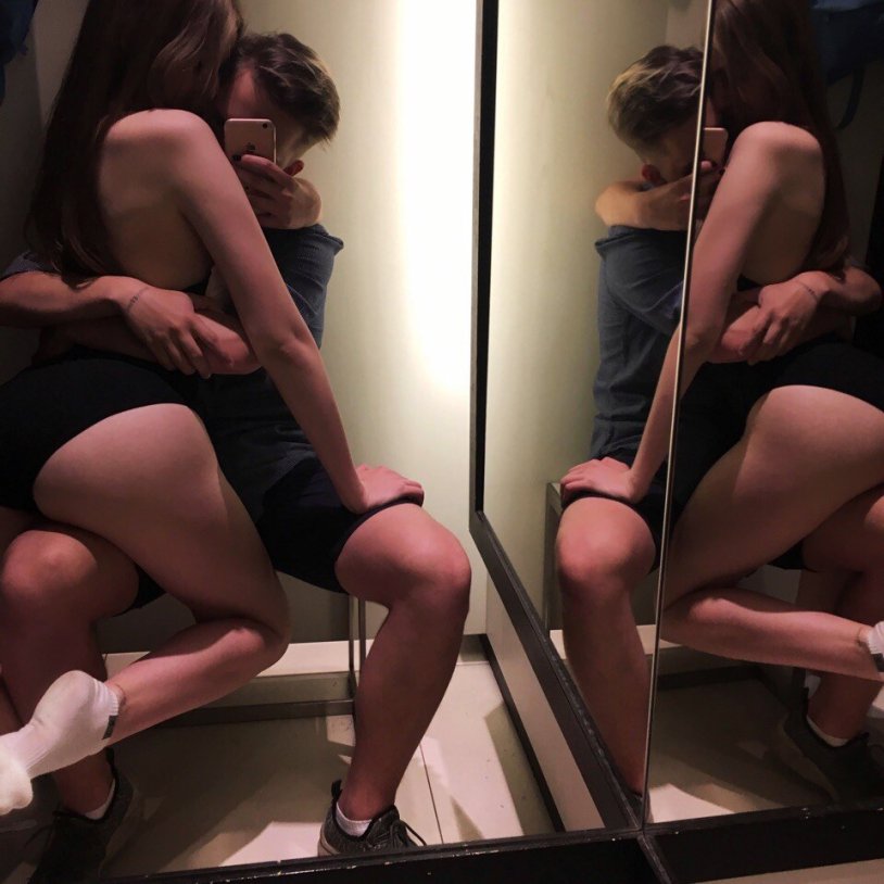 A guy with a girl in the fitting room