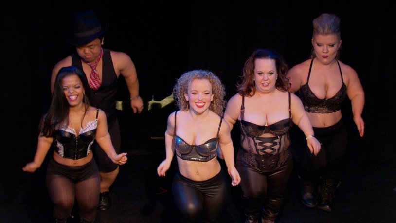 The woman is a dwarf