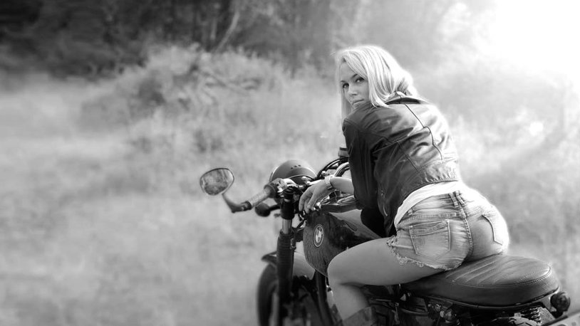 Girl on a motorcycle behind