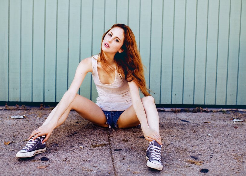 Girl in shorts squat