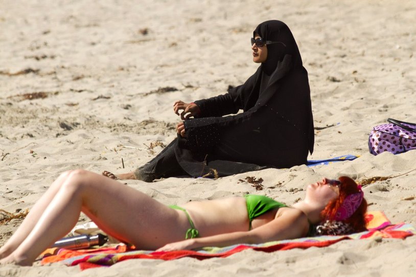 Muslims on the beach in a swimsuit