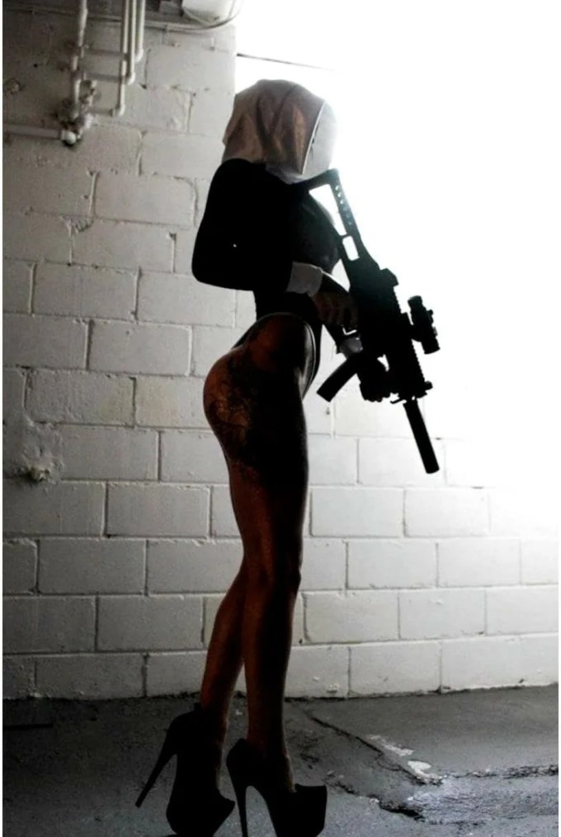 Girl with a gun without face