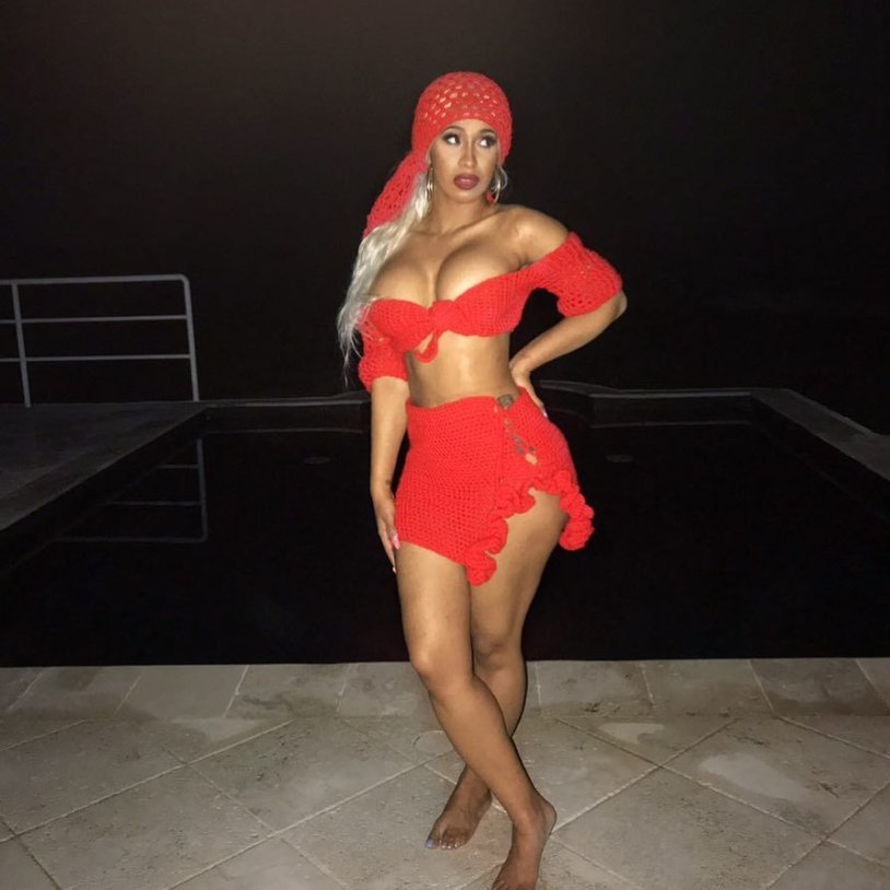 Cardi Bi in a red suit