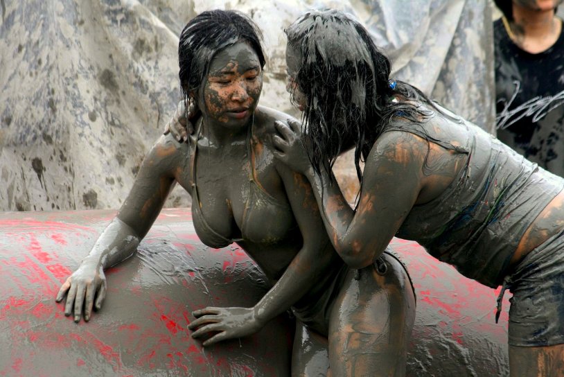 Girl at the mud festival