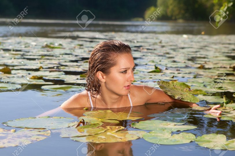 Girls swim on the river