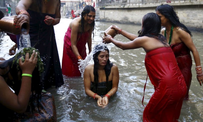 Indian women in Ganges