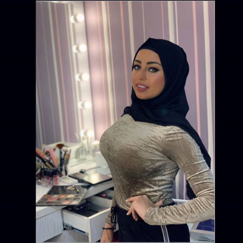 Girl in a hijab with big breasts