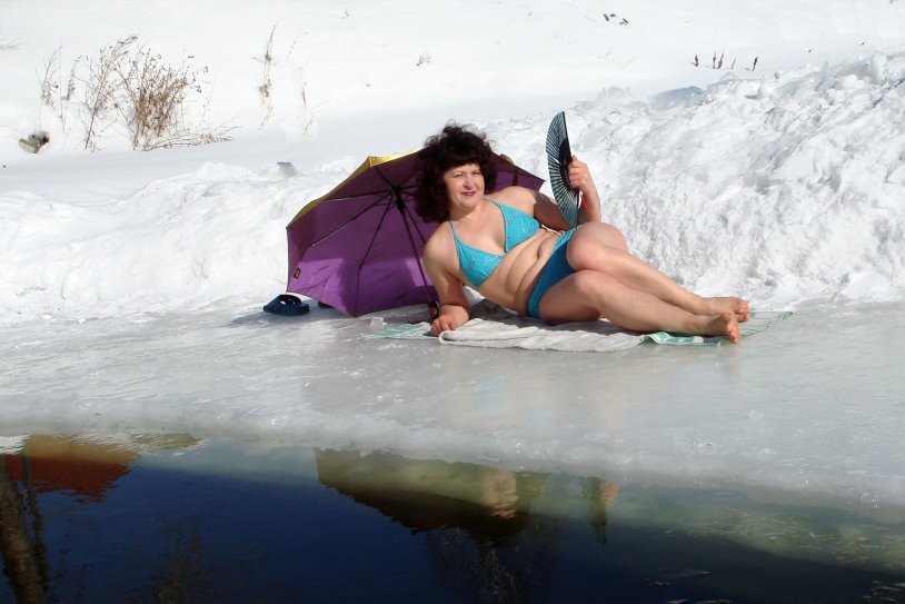 Girl swimming in the snow