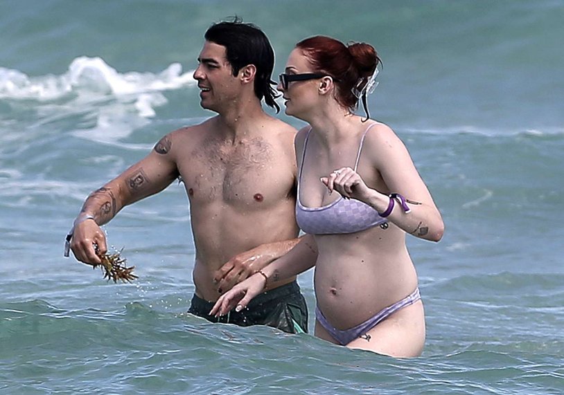 Joe Jonas and Sophie Turner on the beach