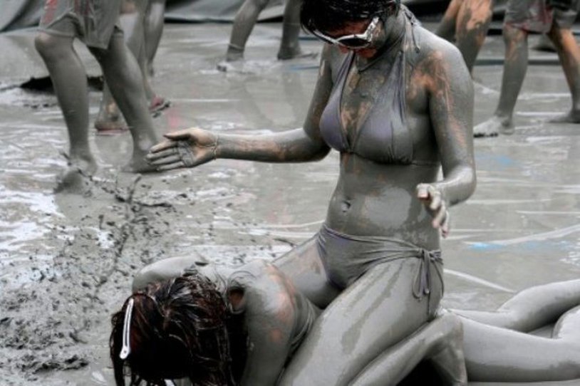Beautiful girls in mud