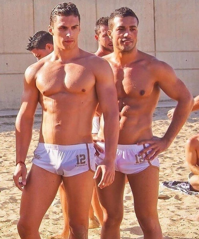 Lots of men in swimming trunks