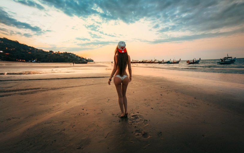 Girl walking on the beach