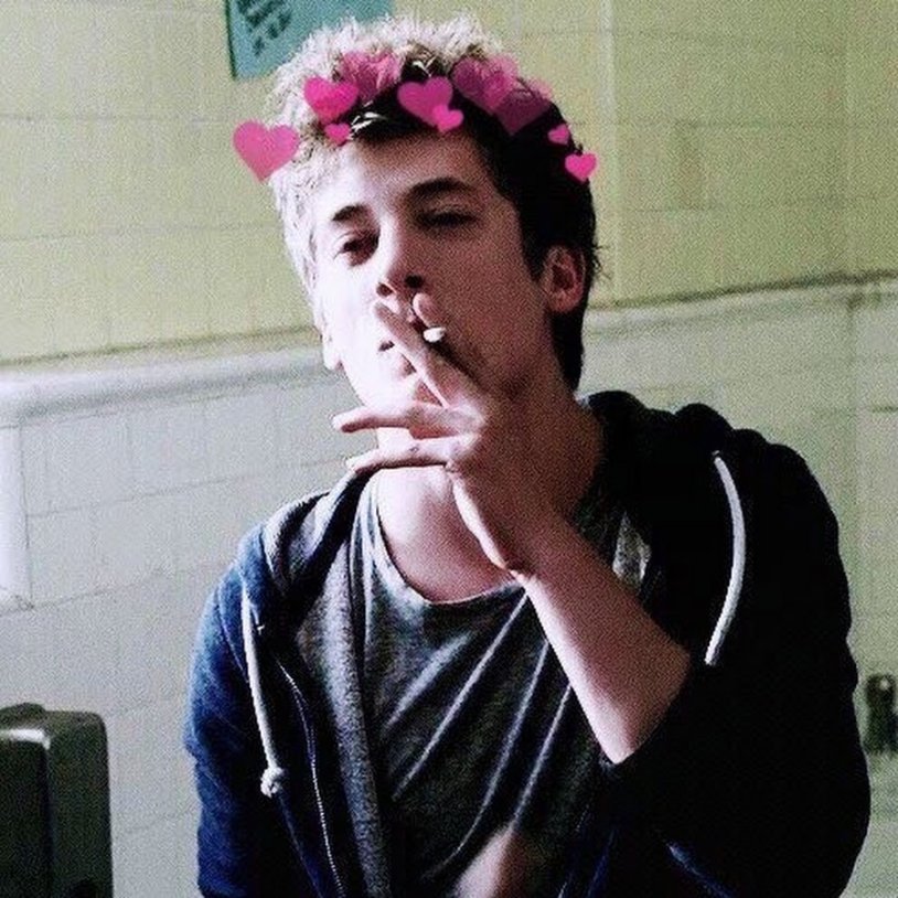 Lip Gallagher smokes