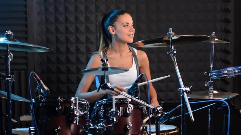 Girl plays on drums