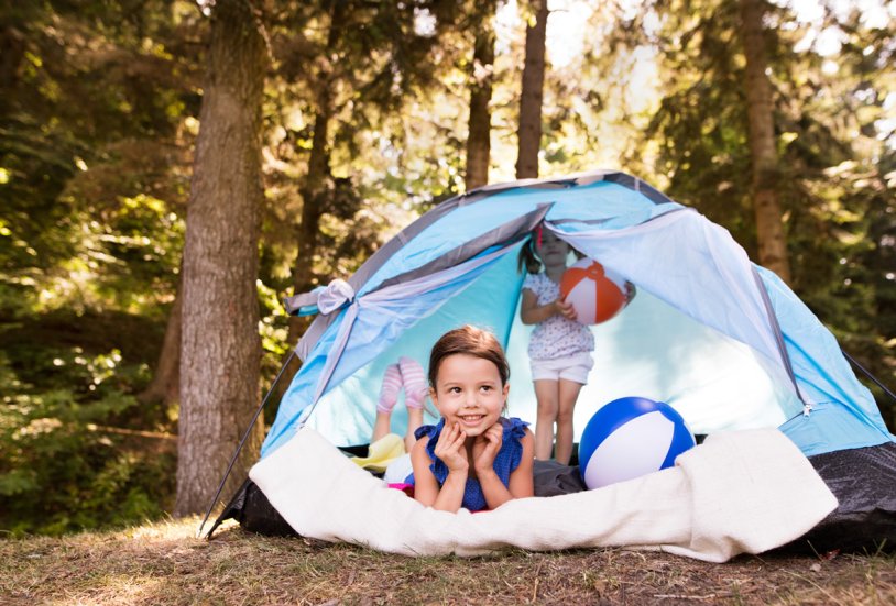 Photo of a girl in a tent in the camp