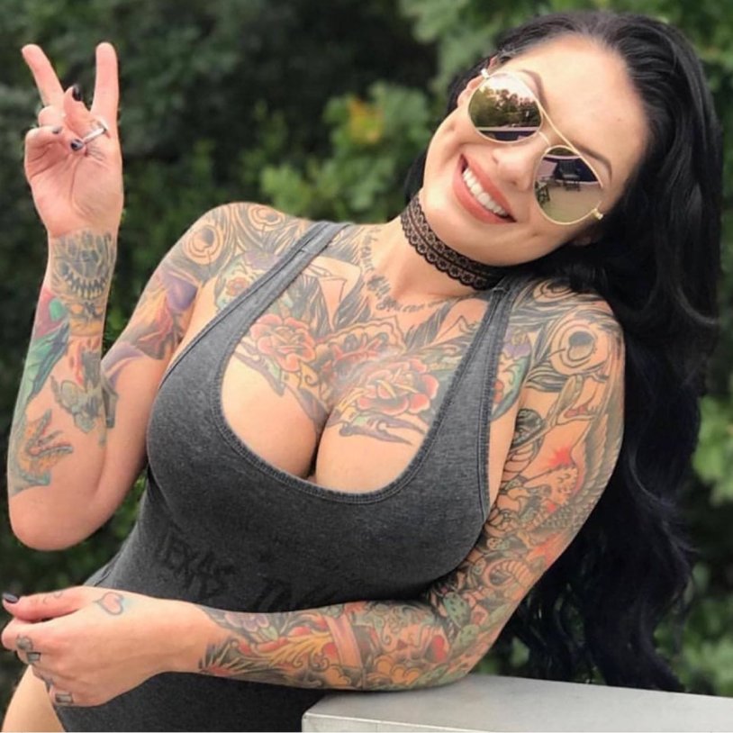 Tattooed buxom