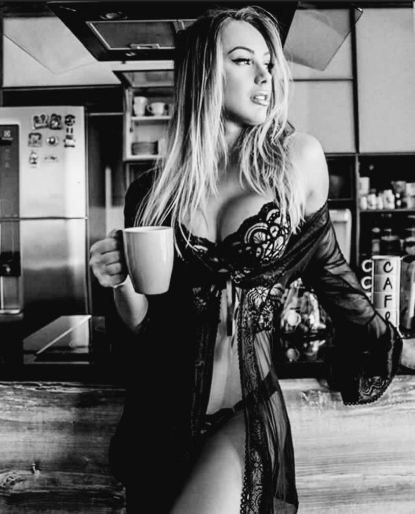 Sexy girl with cup of coffee
