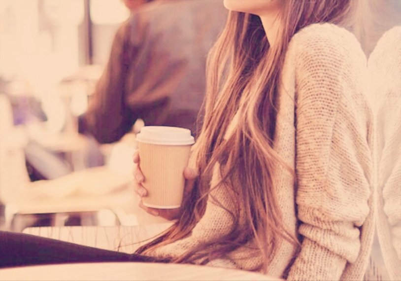 Fair-haired girl in a cafe