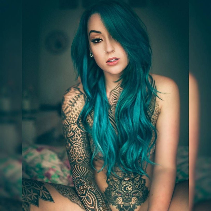 Tattooed girl with blue hair