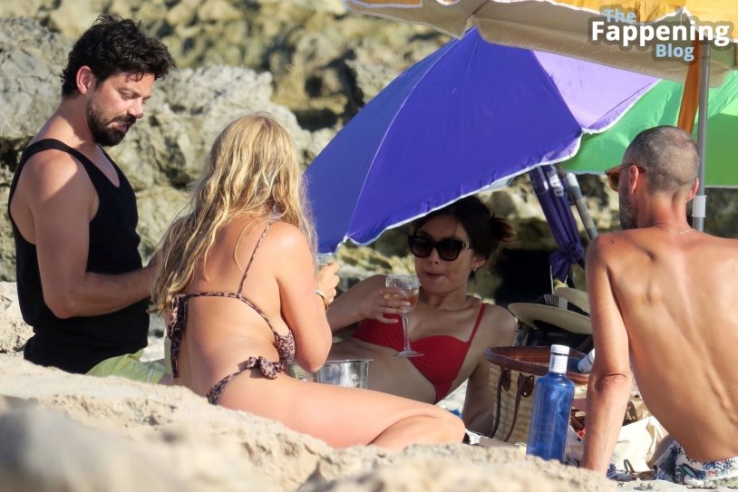 Heidi Klum and Tom Kaulitz on the beach