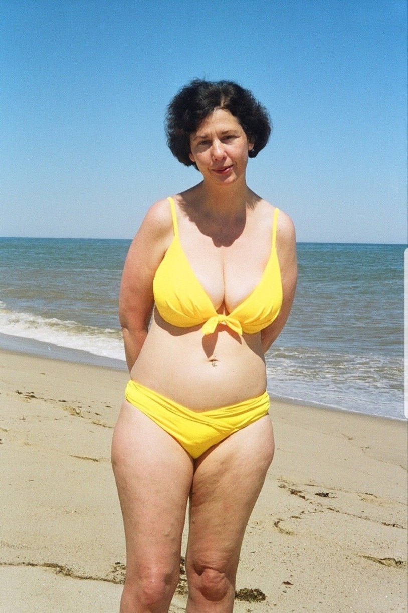 Hairy adult women in swimsuits