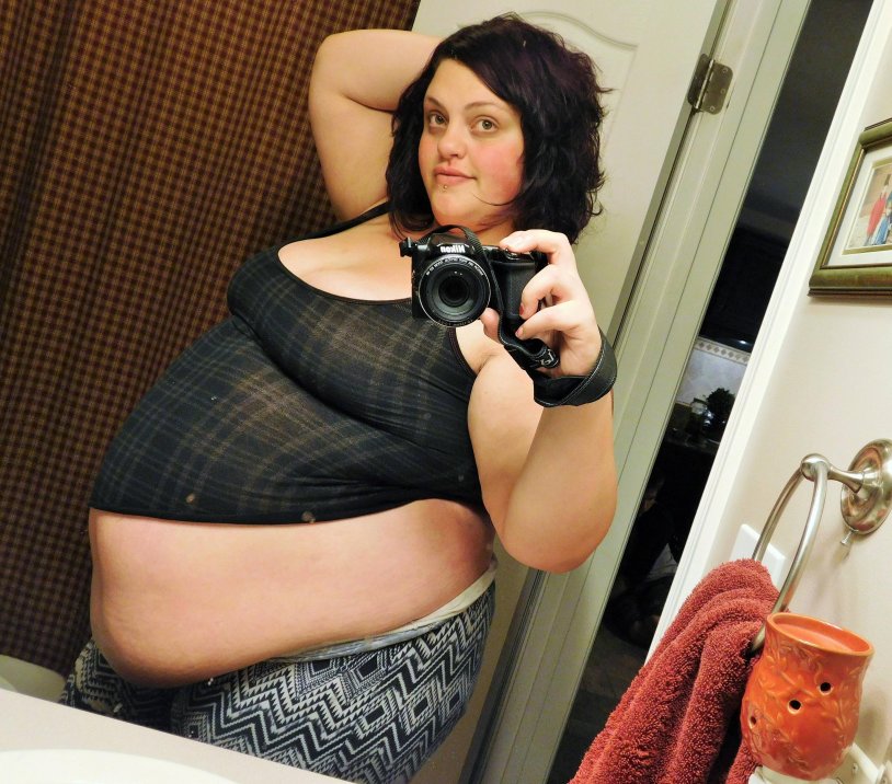 Fat beautiful girls photo with a big belly
