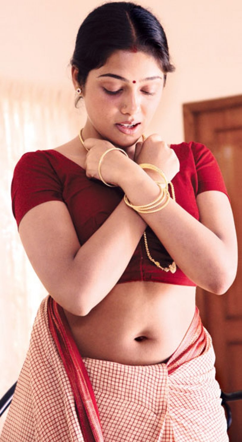 Indian real women in Sari showing navel