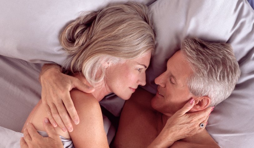 Elderly couple in bed