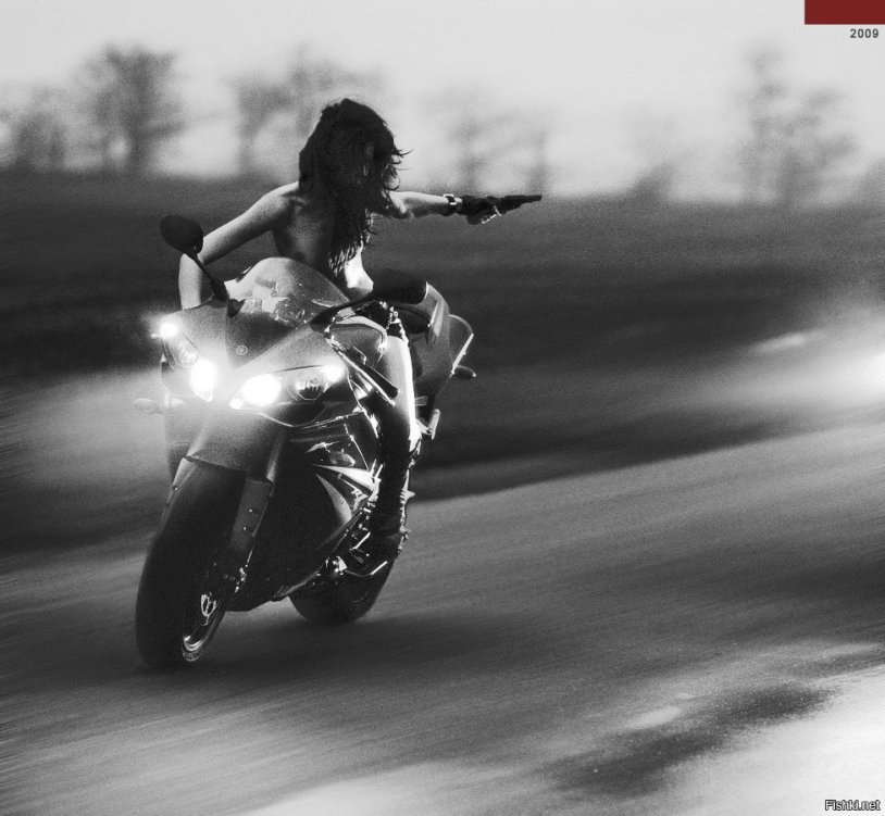 Girl on a motorcycle at speed