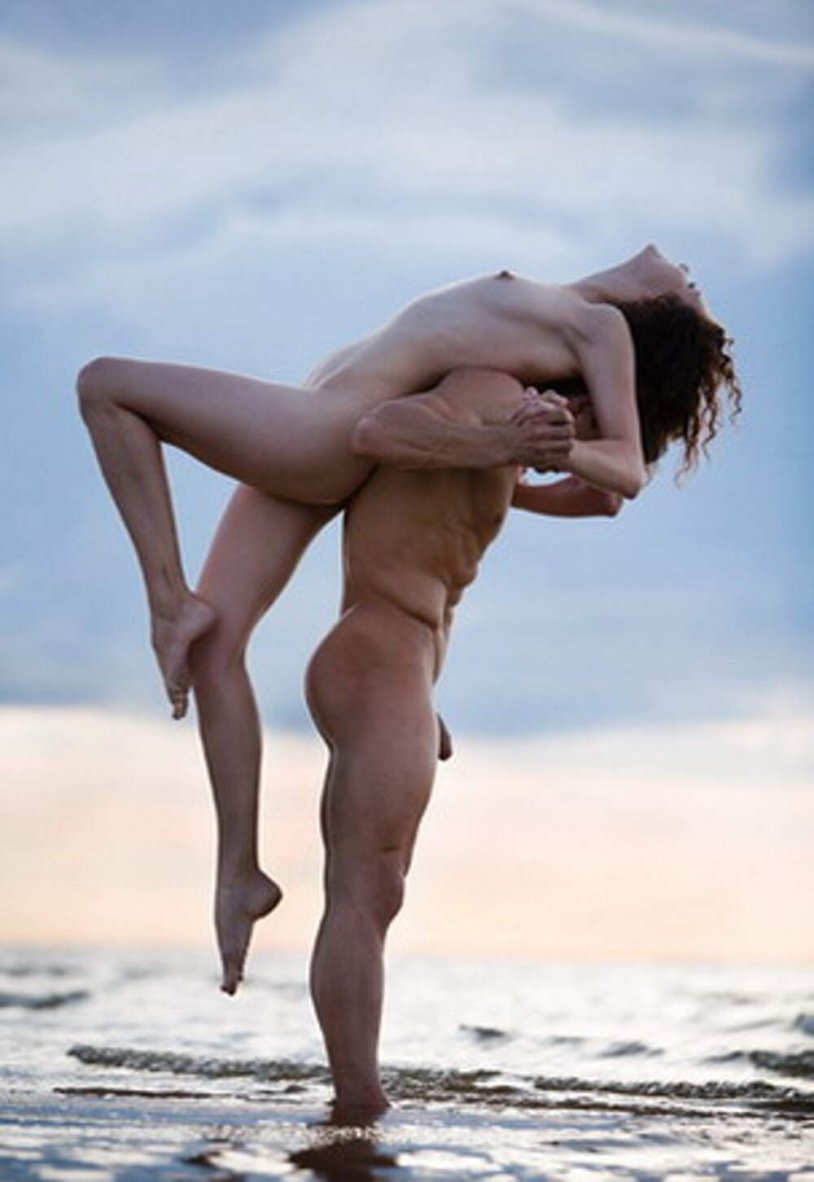 Naked man and woman in water