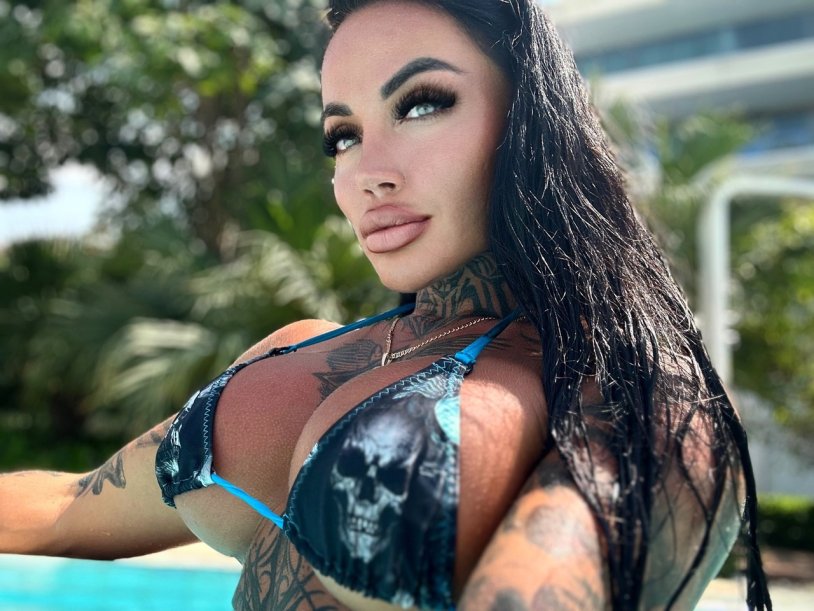 Tattooed bimbo naked