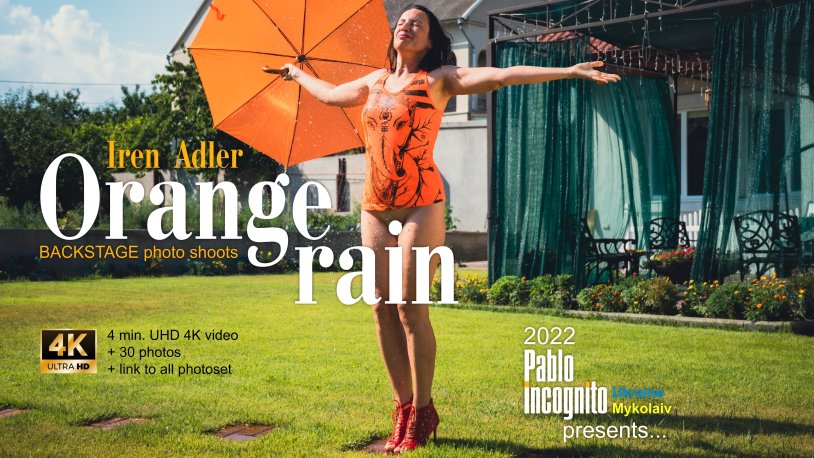 Girl with an orange umbrella