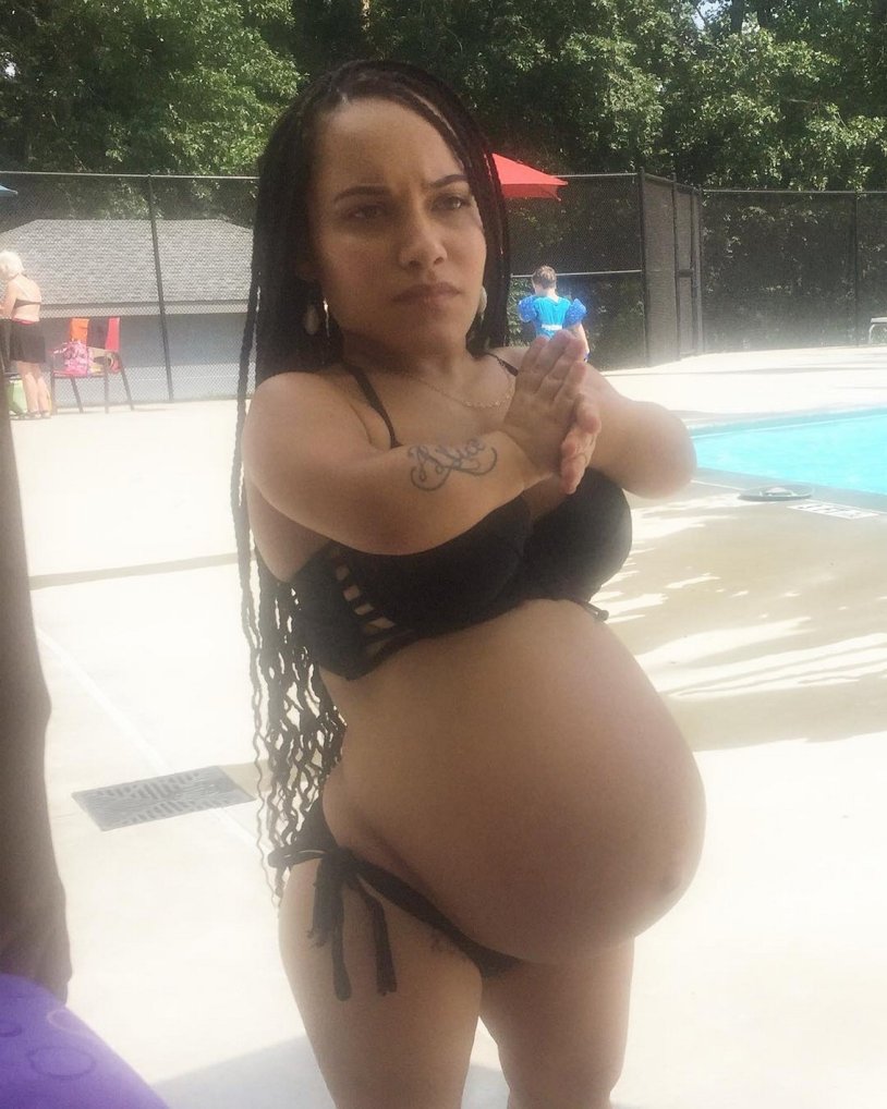 Naked pregnant women in the bathroom