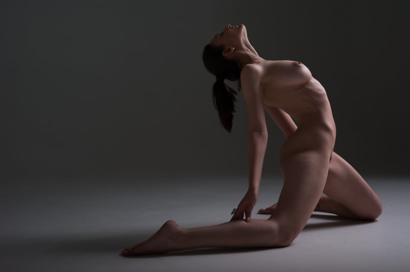 An unusual figure is naked