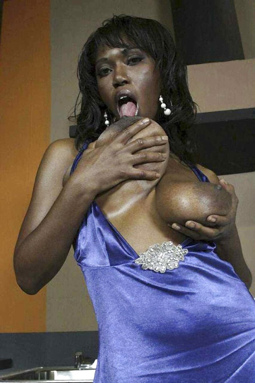 Big breasts of a black woman